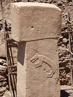 After Eden: Animal Carving on one of the Pillars at Göbekli Tepe.  (Wikimedia Commons)